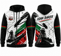 Black, white, red, and green custom hoodie with abstract paint strokes, oil rig graphic, and Oomore Valley Dart Academy logo, front view